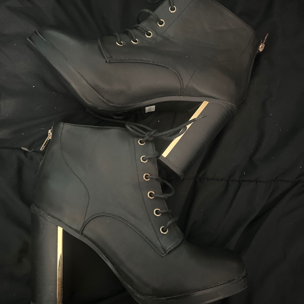 Size 11W Torid black ankle heeled boots
